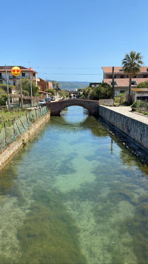 Tra mare e lago Torre di Faro Exterior foto