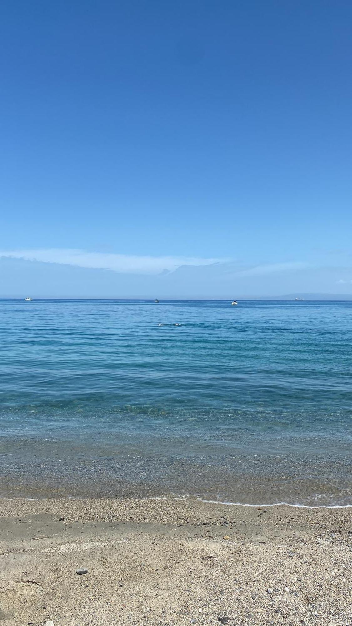 Tra mare e lago Torre di Faro Exterior foto
